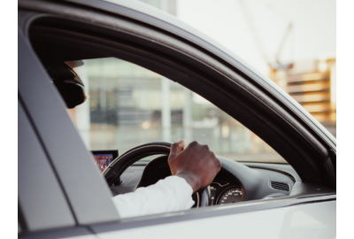 man_at_the_wheel_of_a_private_vehicle