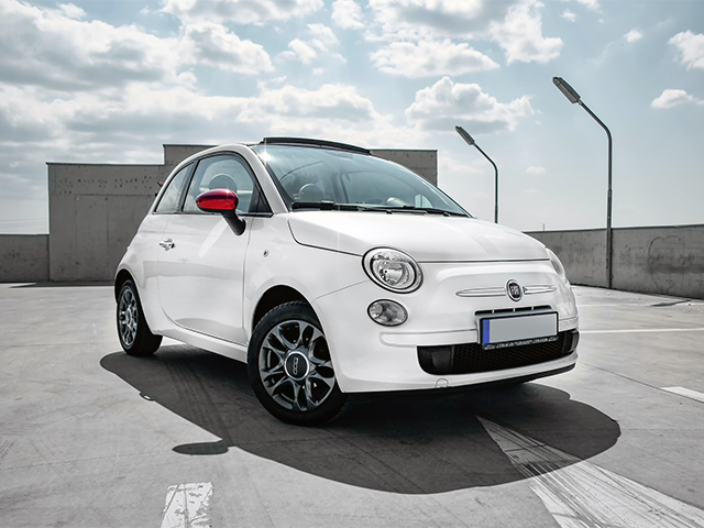 parked_fiat_500_on_top_of_a_multi_story_car_park